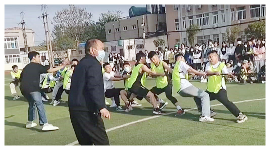 太阳成集团tyc122cc举办第九届春季运动会拔河比赛