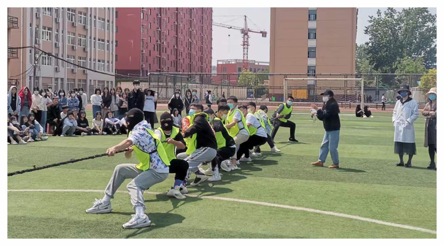 太阳成集团tyc122cc举办第九届春季运动会拔河比赛